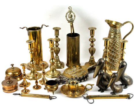 Various brass ware, early 20thC and later, chamberstick, candlesticks 21cm H, fireside companion set, bellows, small cauldron