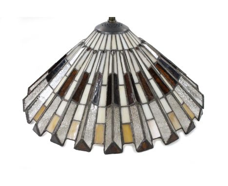 *An as new light fitting, with Art Deco design shade raised with sections predominately in red and cream, 31cm H.