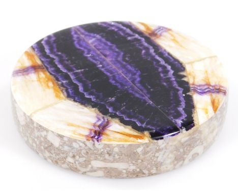 A Blue John paperweight,  the circular body in deep amethyst and light orange and cream colours, 9cm Dia.