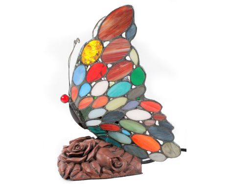 *An as new table lamp, with butterfly shaped shade set with various coloured sections predominately in blue, yellow, green an