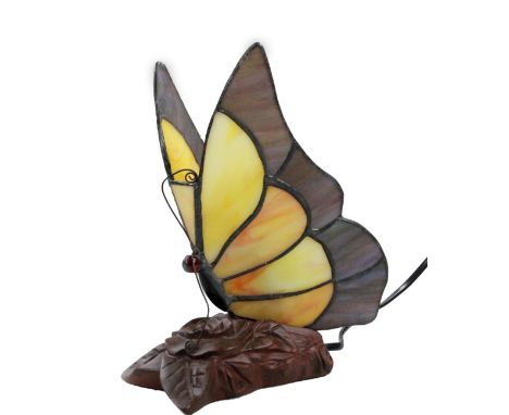 *An as new table light, with Tiffany style butterfly shade predominately in yellow, 22cm H.