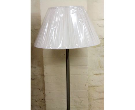 *An as new electrical standard lamp, with cylindrical stem on shaped foot, with textured shade in white, 163cm H.