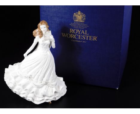 A Royal Worcester Special Occasion figure Golden Moments, printed marks beneath, 25cm H.  (boxed)