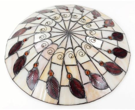 *An as new light fitting, with Tiffany design shade decorated with a repeat leaf pattern predominately in cream and red, 40cm