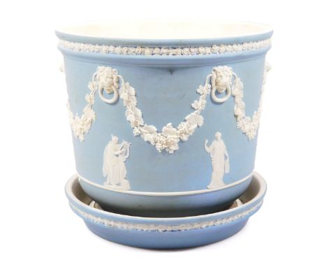 A late 19thC Wedgwood light blue Jasperware jardiniere, with an upper flowerhead border, the main body raised with garlands a