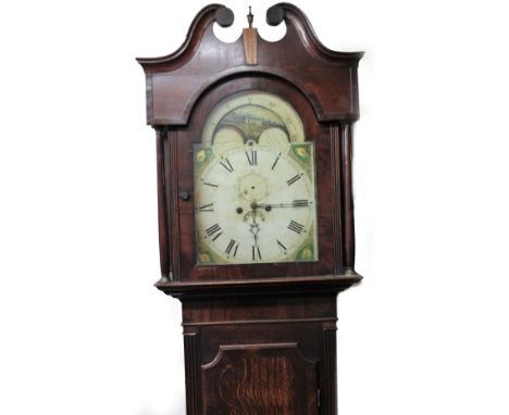 An early 19thC oak and mahogany longcase clock, with swan neck pillared hood, with short moulded trunk door, plain base and b