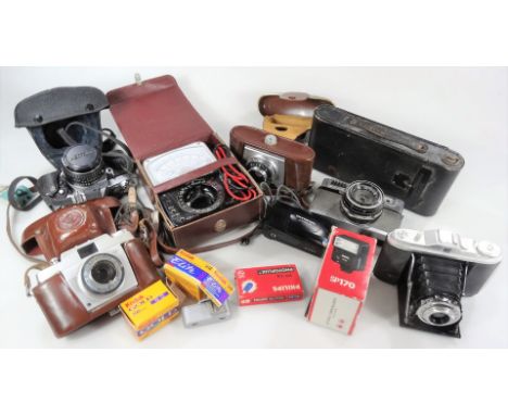 Various cameras and associated equipment, etc., to include Minolta camera, 10cm H, with 1:2.8/45 lens, various other cased ca