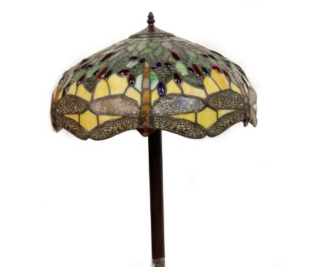 *An as new electrical standard lamp, with Tiffany style shade set with coloured glass sections on a turned stem and square su
