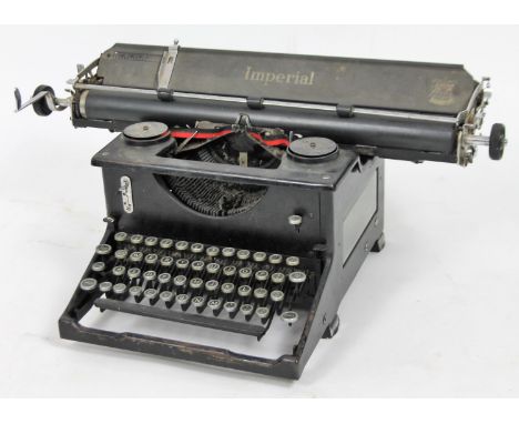 An early 20thC Imperial typewriter, in black with articulated keys, 30cm H.From the estate of R J 'Bob' Curry (Dec'd) of Gran