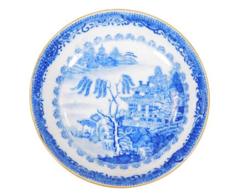 A New Hall porcelain saucer, c.1800, printed in blue and white with a New Hall copy of the Caughley Willow Nankin pattern, 13
