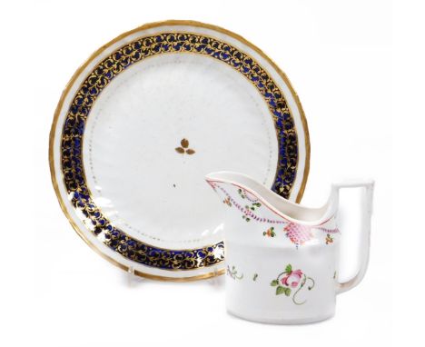 A New Hall porcelain saucer dish, of fluted form decorated with a blue band and C scroll gilding, marked pattern no. 554, 20c