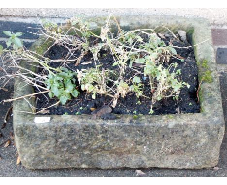 A 19thC hand hewn bull-nose stone trough, 18cm H, 55cm W, 54cm D. From the estate of R J 'Bob' Curry (Dec'd) of Grantham.