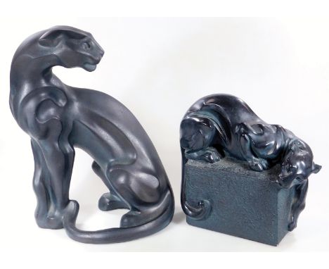 Two figure groups of wild cats, by Austin, the first on a naturalistic setting, 30cm H, another of a standing cat, in metal. 