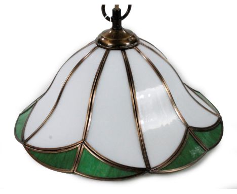 *An as new light fitting, with flowerhead shade predominately in green and white, 22cm H.