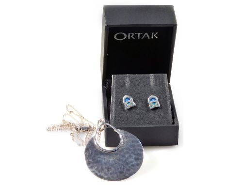 Two items of jewellery, comprising a silver pendant and chain, the pendant in abstract form, and a pair of Ortak silver and e