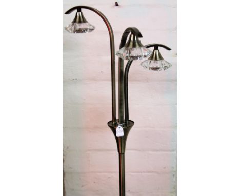 *An as new electrical three branch standard lamp, on cylindrical stem and circular foot, 156cm H.