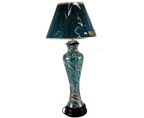 *An as new glass table lamp, on circular foot with RoChamp shade.