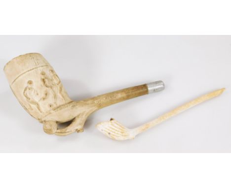 An early 20thC clay football pipe, raised with players with boot and ball stem, RD number and chrome plated mouth piece, 11cm