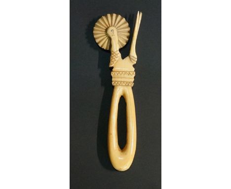 A rare late 18th / early 19th Century marine ivory sailor made combination pastry jigger/fork, pierced handle with cross hatc