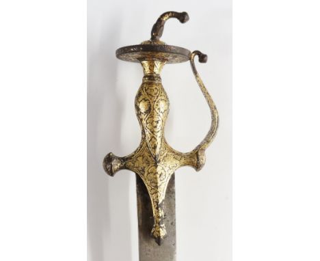 A good late 18th / early 19th Century Persian Damascened sword the handle with disc pommel and foliate wrapped finial with sc