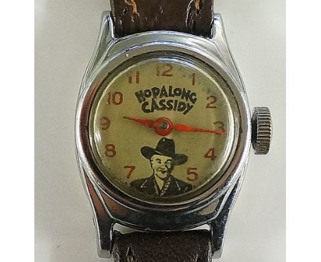 A vintage wristwatch the dial with Arabic numerals inscribed Hopalong Cassidy with head and shoulder portrait, the reverse in