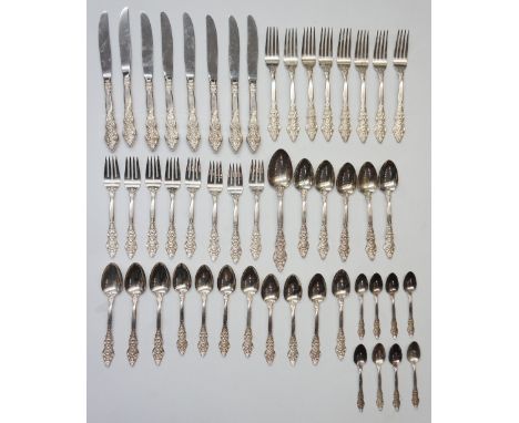 A silver plated canteen of cutlery for eight comprising eight knives, forks, fish forks, spoons, teaspoons, demitasse spoons 