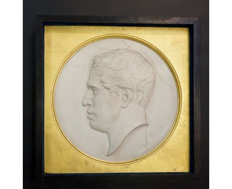 A late 19th Century circular plaster portrait contained within a gilt slip and blue velvet lined ebonised frame, 52cm square 