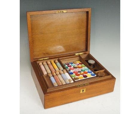 A Victorian mahogany artist's box, the hinged lid engraved AMS, the interior with pottery palette bearing printed mark for Ha