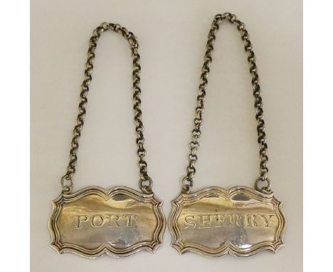 A pair of William IV decanter labels, shaped reeded edges encircling bodies engraved with 'Port' and 'Sherry' respectively, b