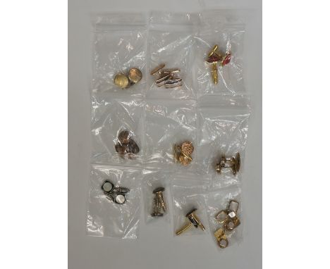 A bag of cufflinks, various styles, mostly gold and silver toned, some with enamelled detailing, others with mother of pearl,