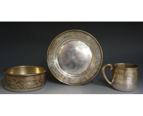 An interesting American silver Christening set comprising a mug, bowl and plate, the mug engraved with four children saying G