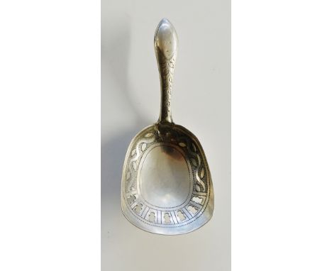 A George III silver caddy spoon, the scoop form bowl engraved with trailing vine and pierced detailing near rim, vacant marqu