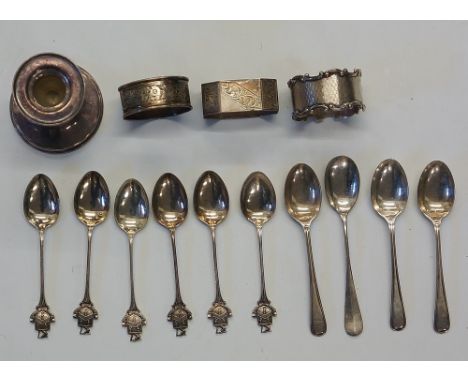 A selection of silver items to include: a set of six teaspoons, the terminal with crest and the motto 'Suivez la Raison', by 