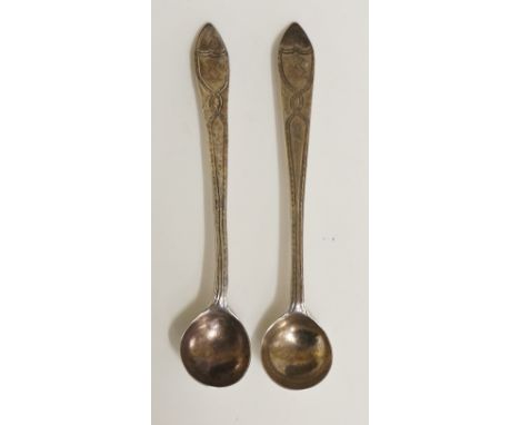 A pair of Irish silver mustard spoons, ribbon detailing to stems, shield shaped cartouche to each terminal engraved with two 