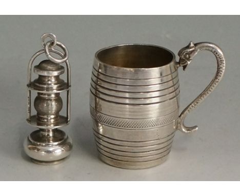 A miniature silver barrel shaped mug with serpent handle, the body with chequered central band beneath reeded borders, 4cm hi