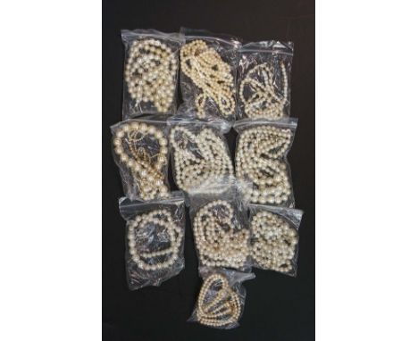 A bag of vintage and modern simulated pearl necklaces of various styles (qty) 