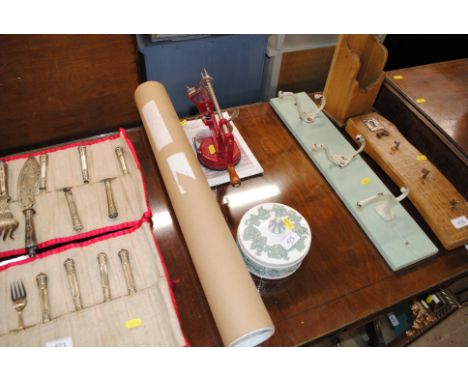 A Wedgwood and Barlaston box and cover, a Victorio apple peeler and a tube of rolled prints