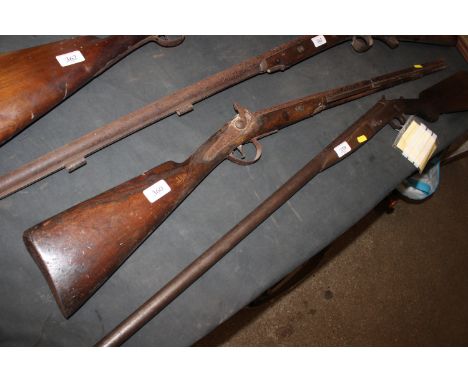 An antique percussion shotgun