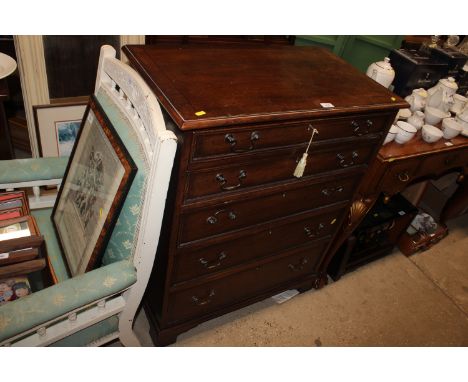 A 19th Century secretaire chest fitted three long drawers below 