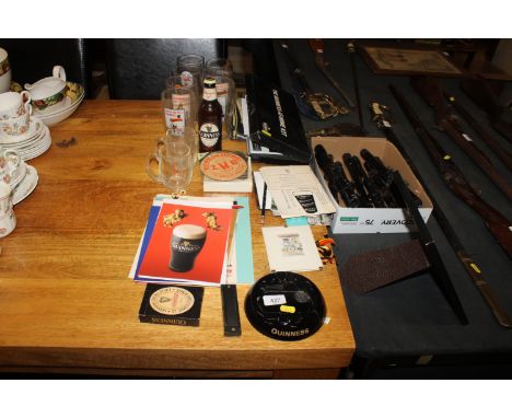 A quantity of Guinness advertising related items to include Harmonica, ash tray, Toucan, badge, various glasses, beer mats et