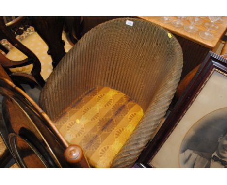 A Lloyd loom armchair&nbsp;