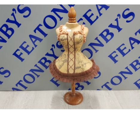 At Auction: AN EARLY 20TH CENTURY DRESSMAKERS MANNEQUIN on an