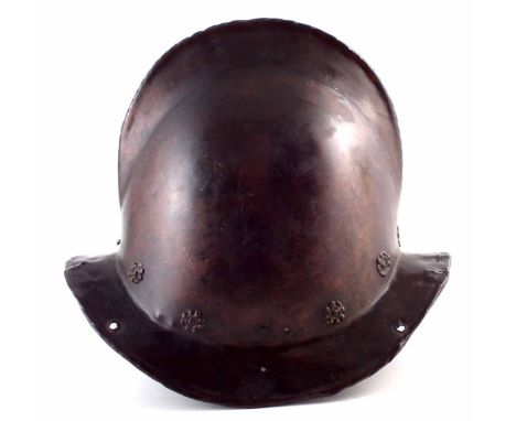 Renaissance style Cabasset or Morion helmet, two piece construction with turned over brim border decorated with ornamental br