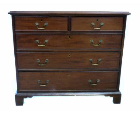 George III mahogany chest of two short and three long graduated drawers, fitted original brass bail handles, rectangular top 