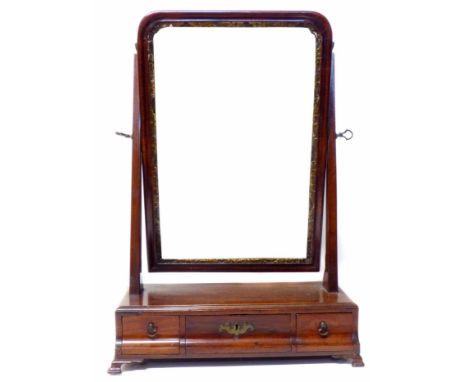 George III mahogany dressing table mirror, rectangular tilt top with gesso slip supported on sticks, box base with ogee front