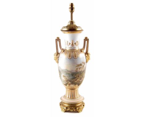 Continental porcelain lamp, with twin mask handles, painted with landscapes within pink and gilt grounds, with ormolu fitting