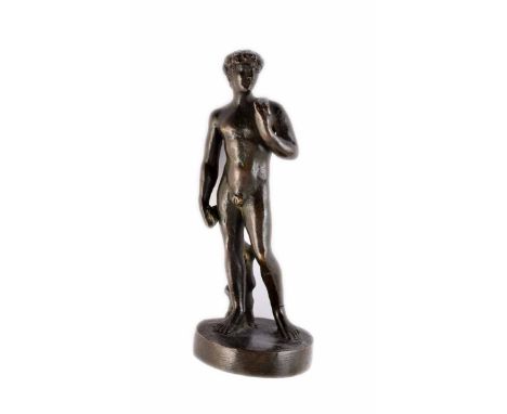 A small bronze figure of David. 13cm height.     CR: Leg has split and been repaired.