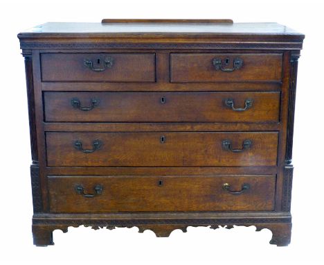 George III oak chest of two short and three long graduated drawers, rectangular top above frieze with blind fretwork, drawers