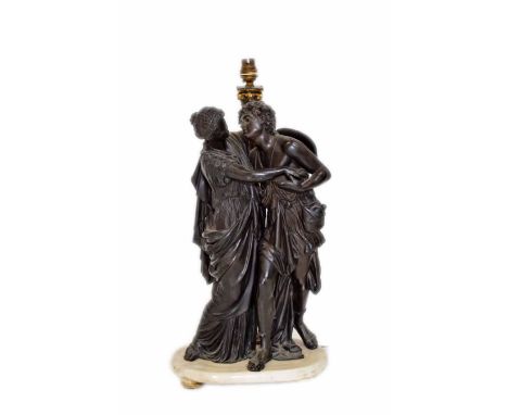 Spelter lamp of two figures embracing. On marble stand with gilt corinthian lamp column. 50 x 26cm.