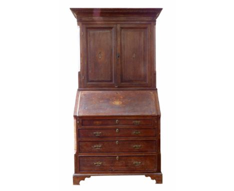 George III oak bureau bookcase, top section with moulded dentil cornice above two raised and fielded panelled doors, cross ba